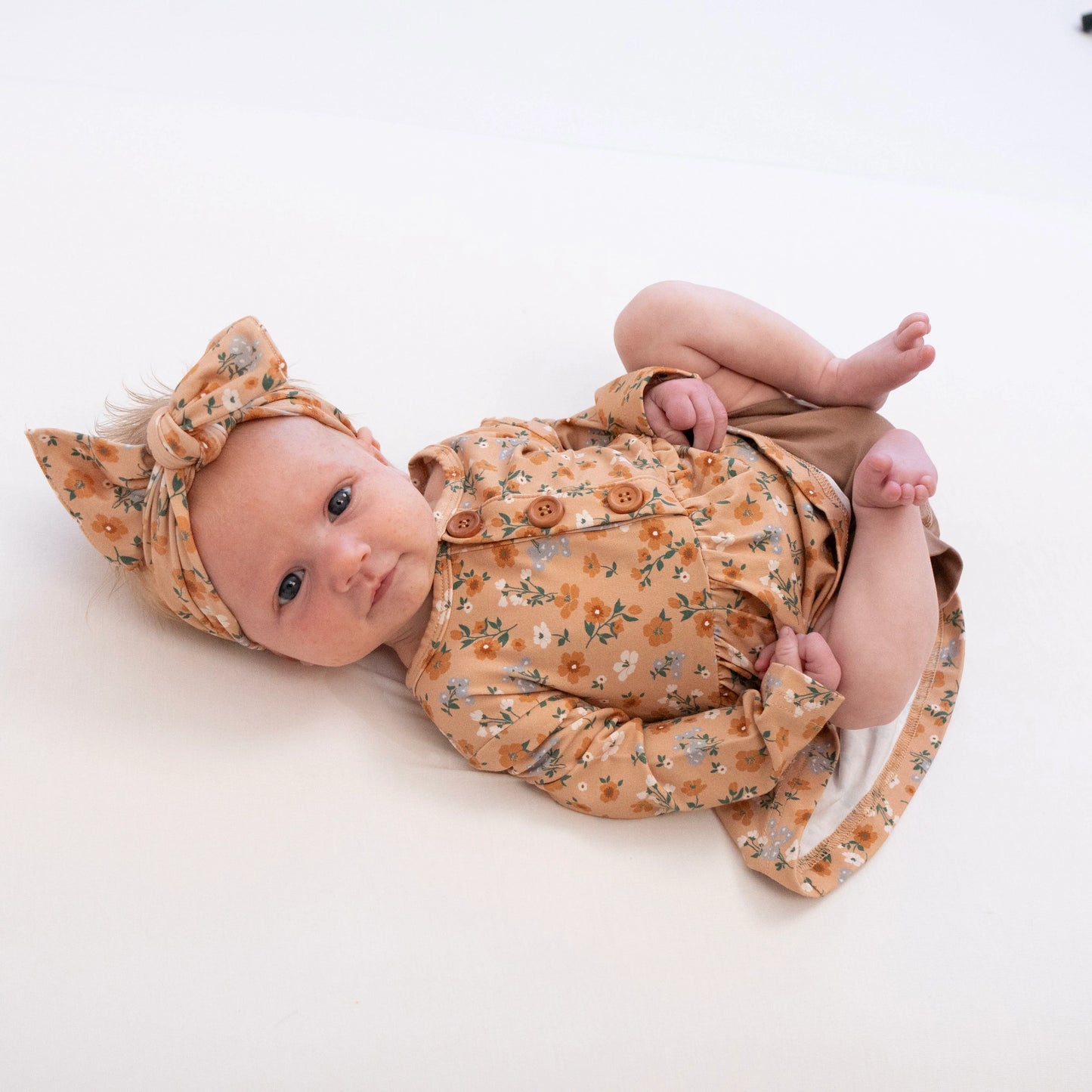 Amber Garden Long Sleeve Peplum Dress