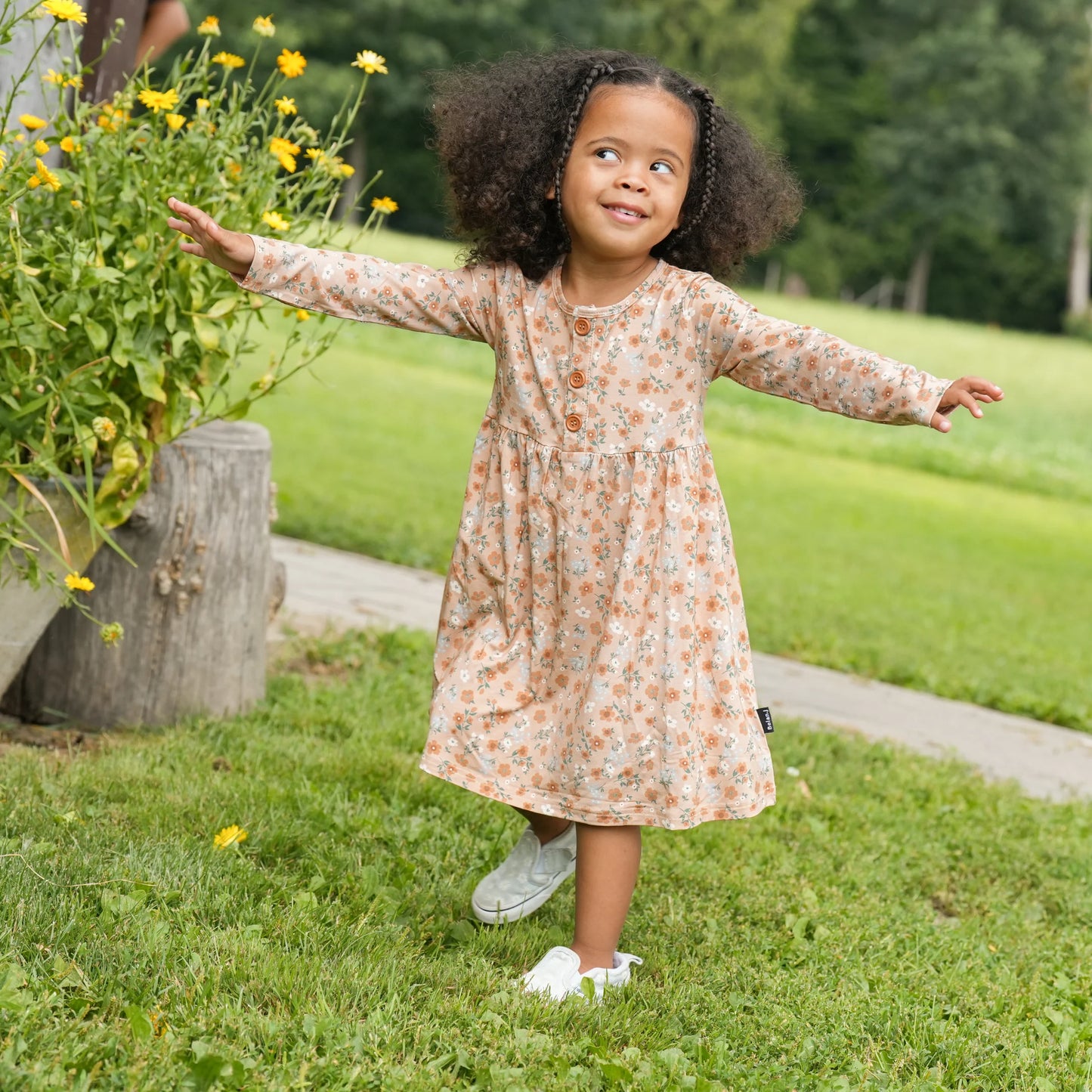 Amber Garden Long Sleeve Peplum Dress