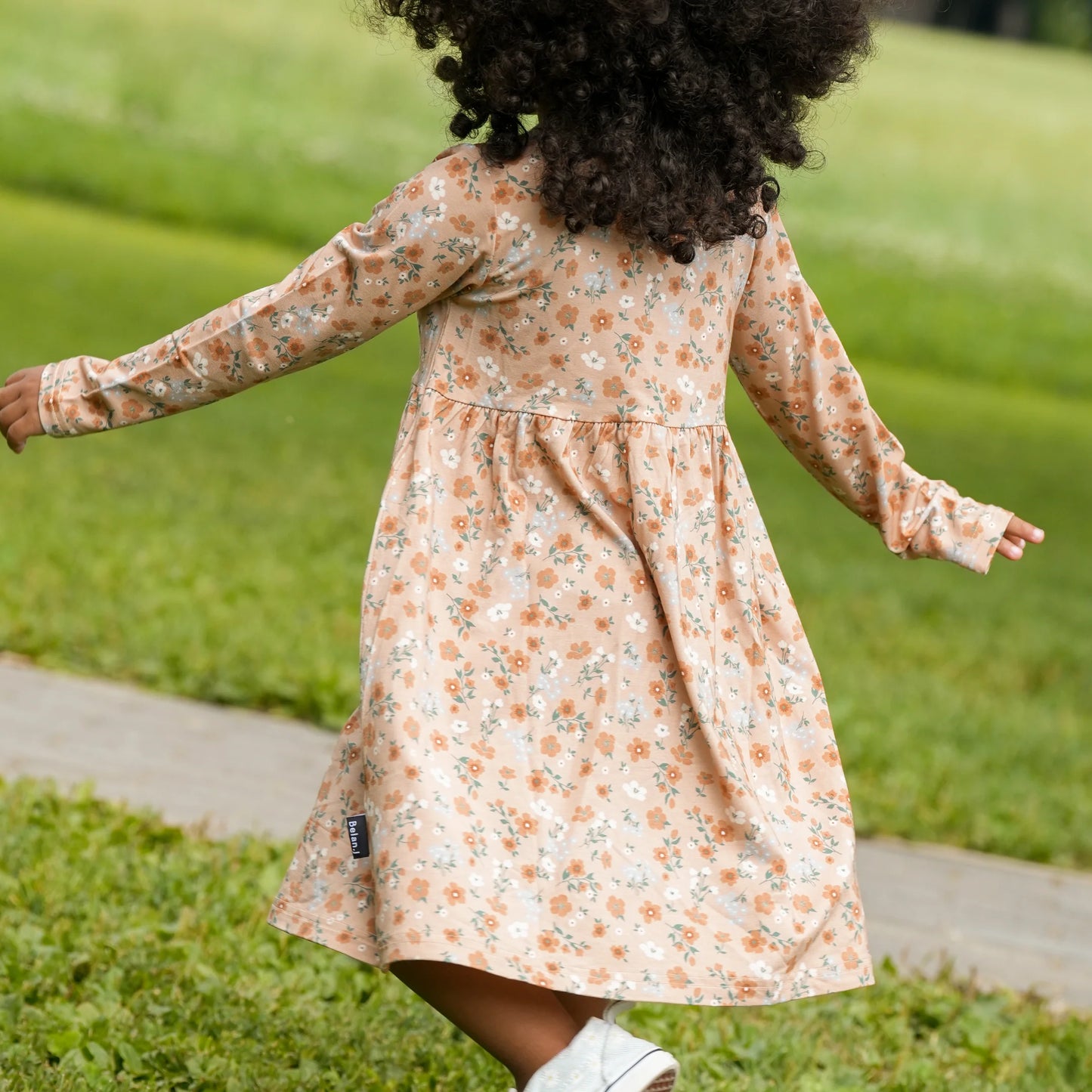 Amber Garden Long Sleeve Peplum Dress