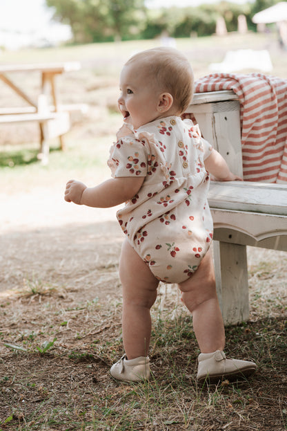 Strawberry Print on Soft Pink Ribbed Bubble Romper