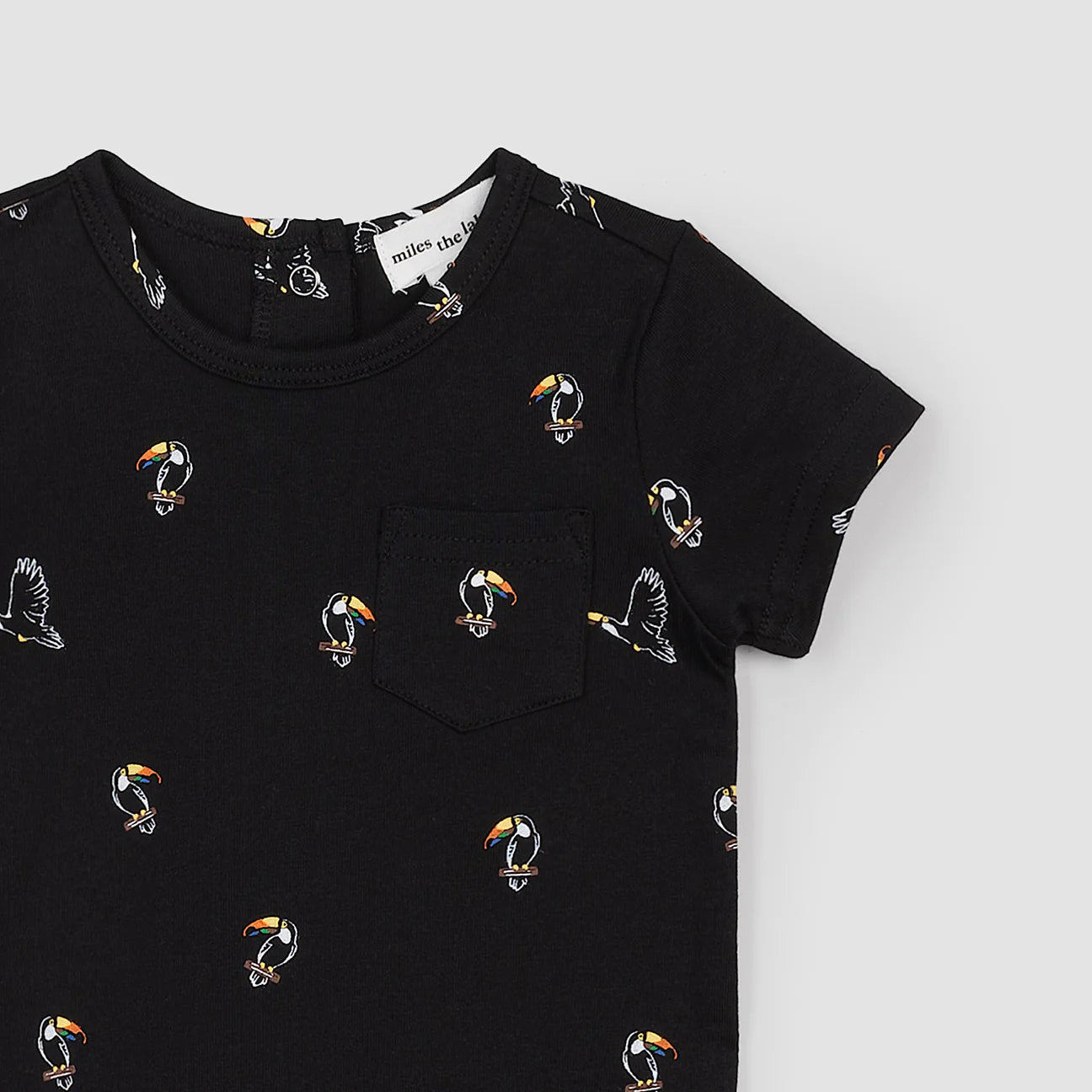 Toucan Print on Black Romper