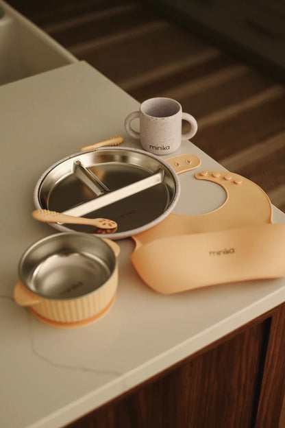 Stainless and silicone suction plate